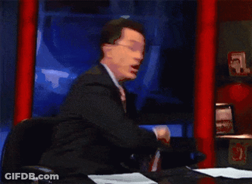 Man In Suit Holding American Flag Saying USA GIF