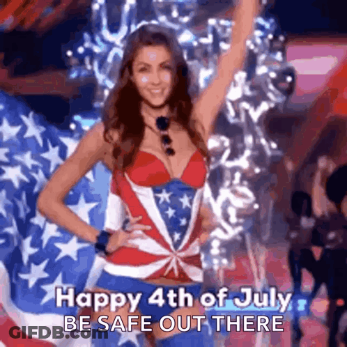 Man In Suit Holding American Flag Saying Welcome Back GIF