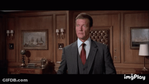 Man In Suit Holding Ball With Imgplay GIF