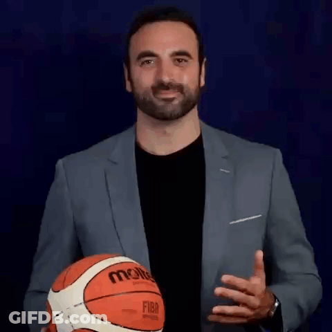 Man In Suit Holding Basketball GIF