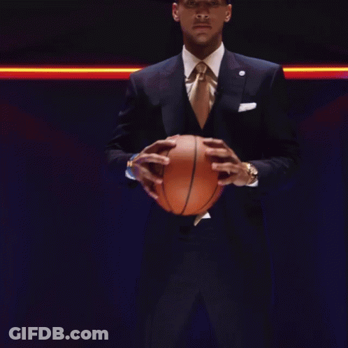 Man In Suit Holding Basketball GIF