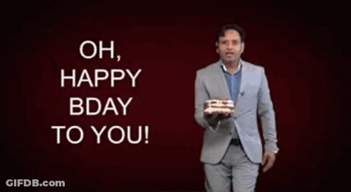 Man In Suit Holding Birthday Cake Saying Oh Happy Bday To You GIF