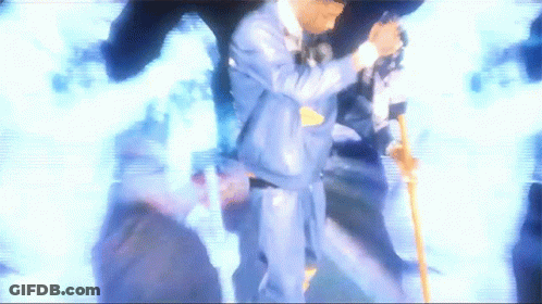 Man In Suit Holding Cane GIF