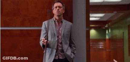 Man In Suit Holding Cane GIF
