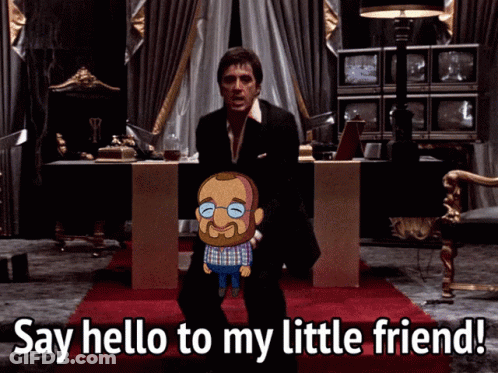 Man In Suit Holding Cartoon Character Say Hello GIF
