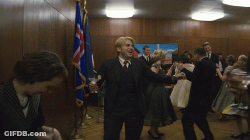 Man In Suit Holding Champagne GIF