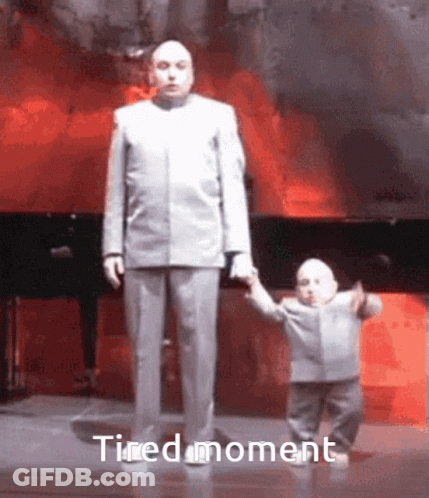 Man In Suit Holding Child's Hand Wearing Colorful Mask GIF