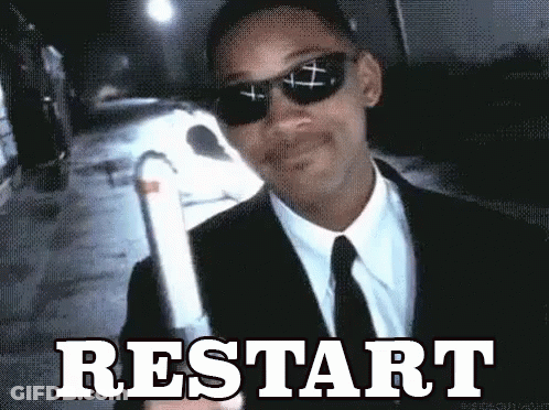 Man In Suit Holding Cigarette Saying Restart GIF