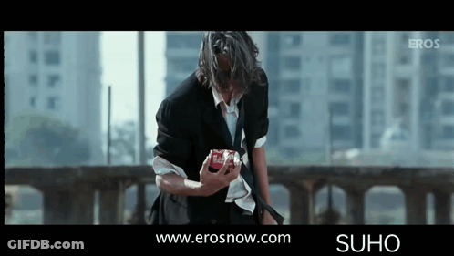 Man In Suit Holding Coca Cola Can GIF