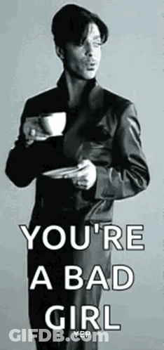 Man In Suit Holding Coffee And Plate GIF
