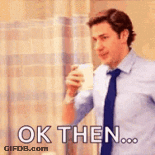 Man In Suit Holding Coffee Saying Ok Then GIF
