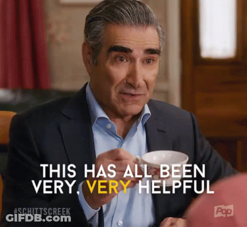 Man In Suit Holding Coffee Says This Has All Been Very Very Helpful GIF