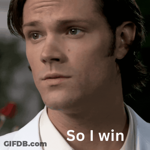 Man In Suit Holding Did I Win Paper GIF