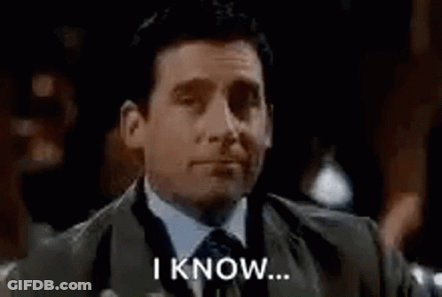 Man In Suit Holding Drink Saying I Know GIF