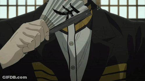 Man In Suit Holding Fan GIF