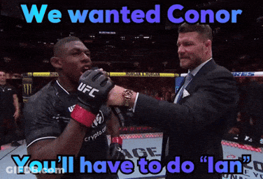 Man In Suit Holding Fighter Hand Says We Wanted Conor You'll Have To Do Lan GIF