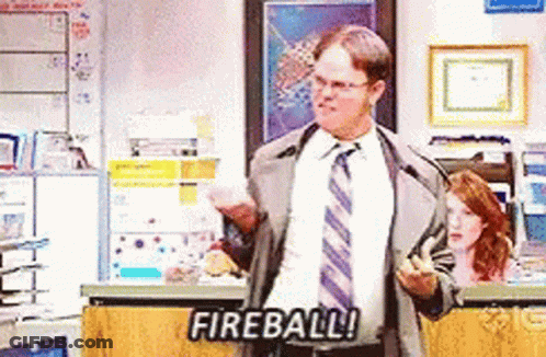 Man In Suit Holding Fireball GIF