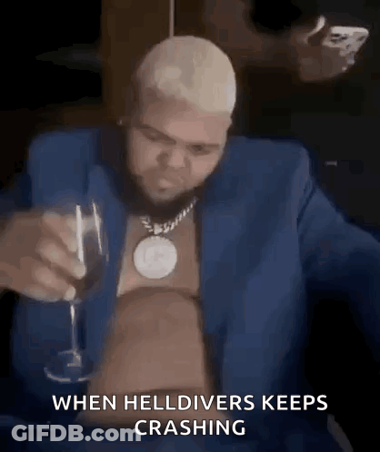 Man In Suit Holding Glass Of Wine GIF