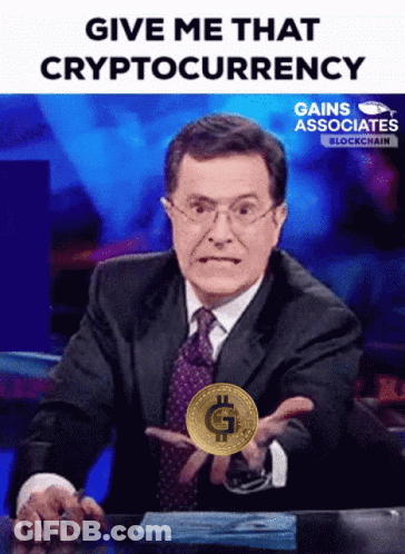 Man In Suit Holding Gold Coin With G GIF
