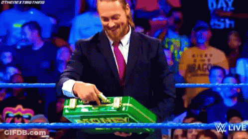 Man In Suit Holding Green Box Saying Smackdown GIF