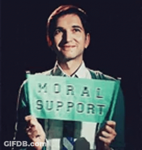 Man In Suit Holding Green Sign Moral Support GIF