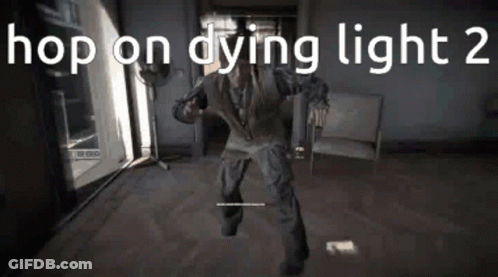 Man In Suit Holding Gun In Video Game GIF