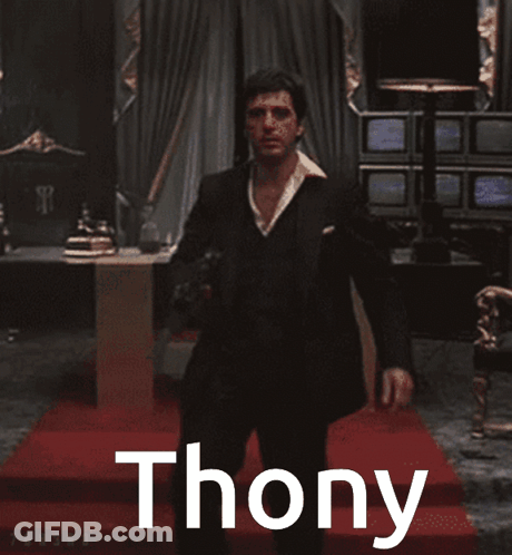 Man In Suit Holding Gun Thony GIF