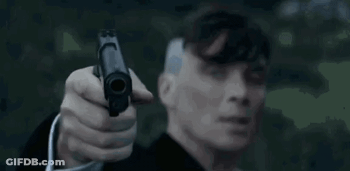 Man In Suit Holding Gun To Forehead GIF