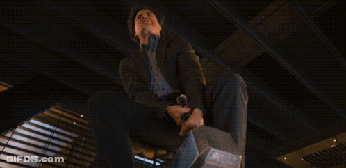 Man In Suit Holding Hammer GIF