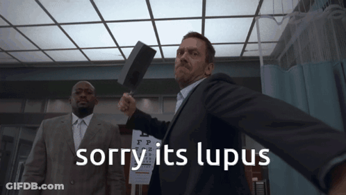 Man In Suit Holding Hammer Sorry Its Lupus GIF