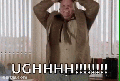Man In Suit Holding Head And Screaming GIF