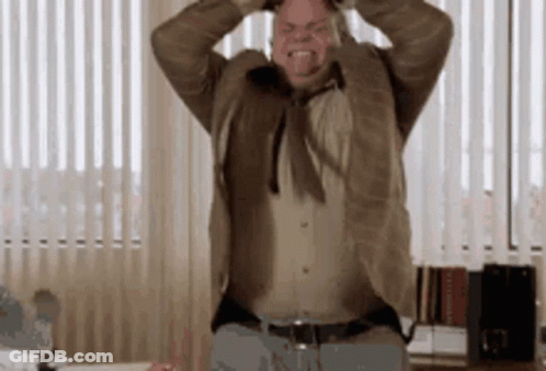 Man In Suit Holding Head GIF