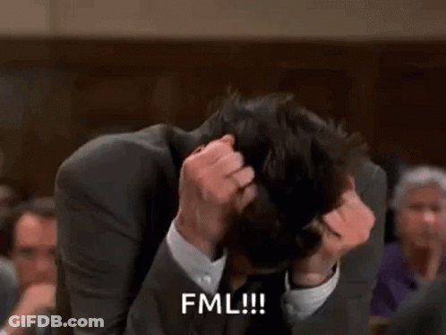 Man In Suit Holding Head Saying FML GIF