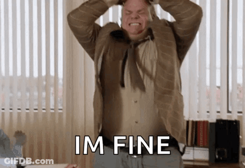 Man In Suit Holding Head Says Im Fine GIF