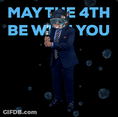 Man In Suit Holding Lightsaber GIF