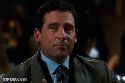 Man In Suit Holding Martini GIF
