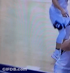 Man In Suit Holding Microphone Blue Wall NBA GIF