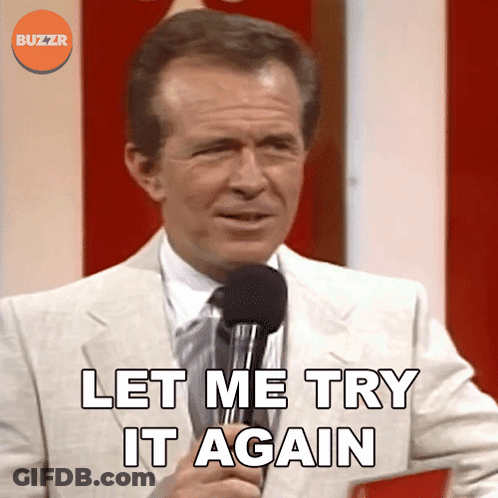 Man In Suit Holding Microphone GIF