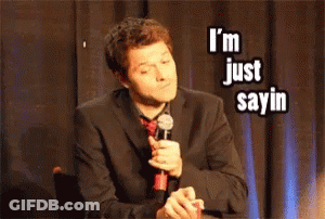 Man In Suit Holding Microphone Saying I'm Just Sayin GIF