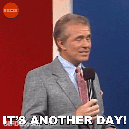 Man In Suit Holding Microphone Saying It's Another Day GIF