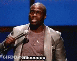 Man In Suit Holding Microphone Saying Nooo GIF