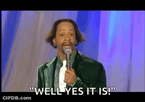 Man In Suit Holding Microphone Saying Well Yes It Is GIF