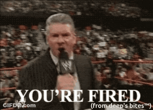 Man In Suit Holding Microphone Says You Re Fired GIF