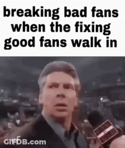 Man In Suit Holding Microphone GIF
