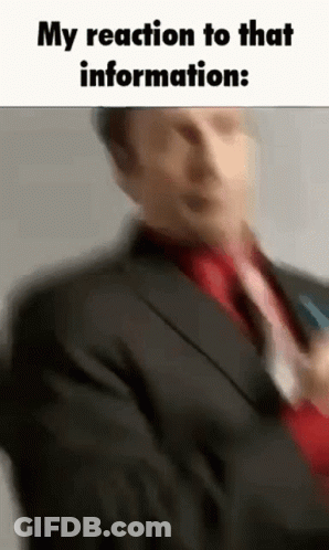 Man In Suit Holding Microphone Talking GIF