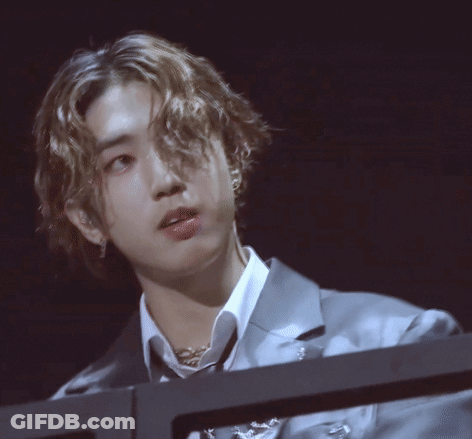 Man In Suit Holding Microphone GIF