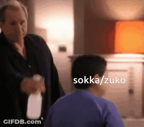 Man In Suit Holding Milk Bottle GIF