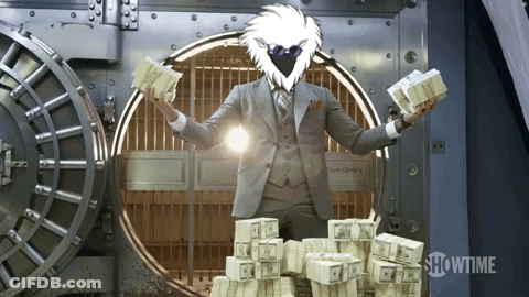 Man In Suit Holding Money At Showtime Vault GIF