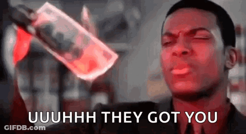 Man In Suit Holding Money Bottle Saying They Got You GIF