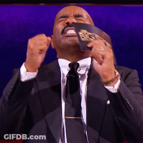 Man In Suit Holding Paper ABC GIF